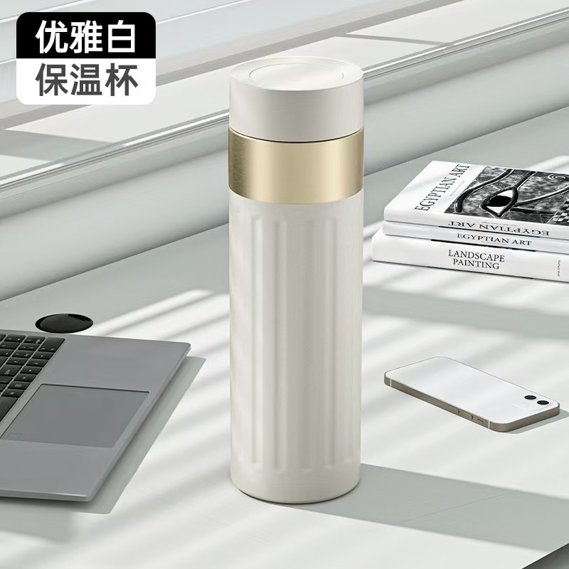 thermos-flask-vacuum-insulated-white-gold-desk-lifestyle